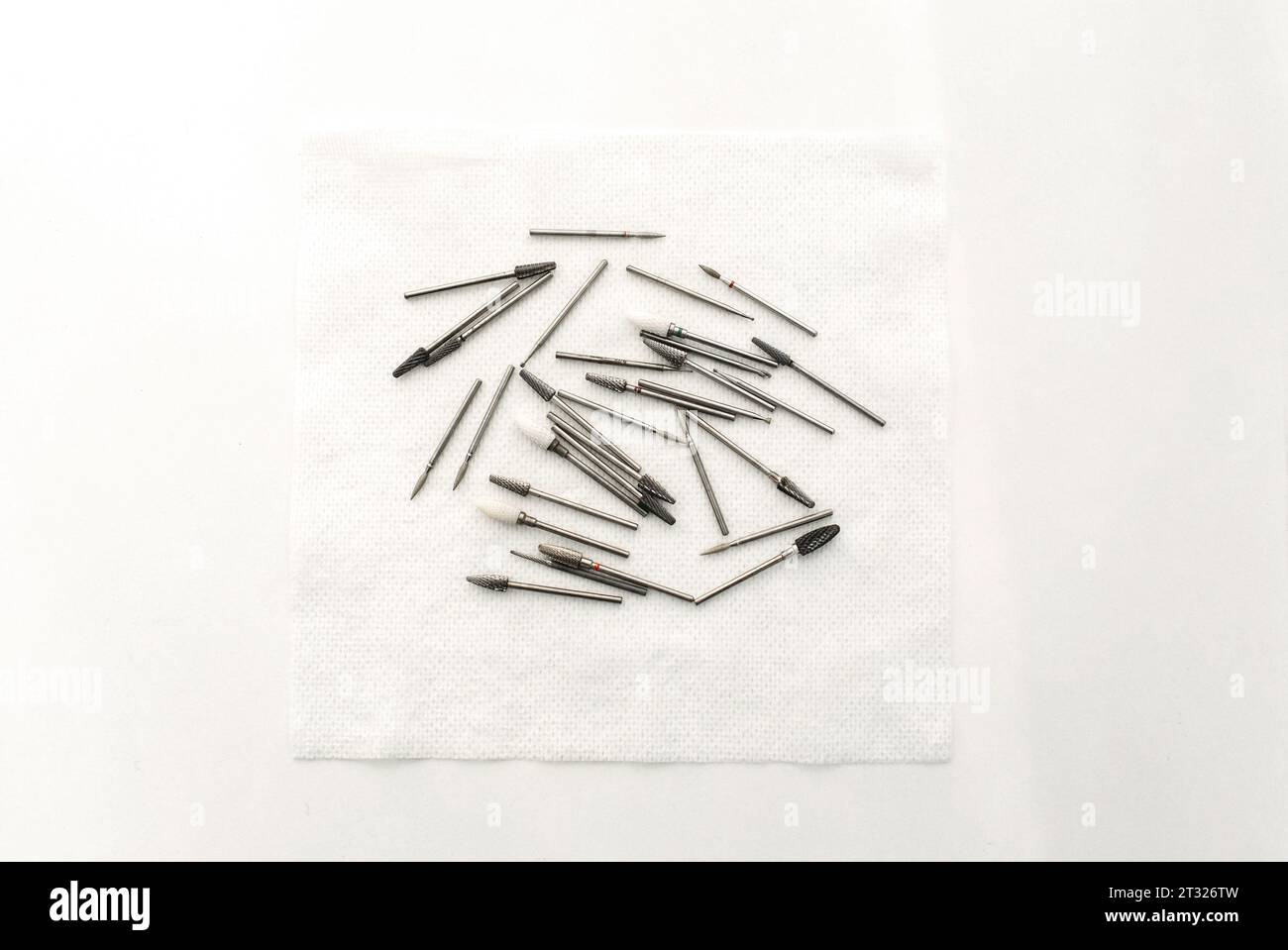 Podologist's medical instruments. Mill for processing the nail plate. Stock Photo