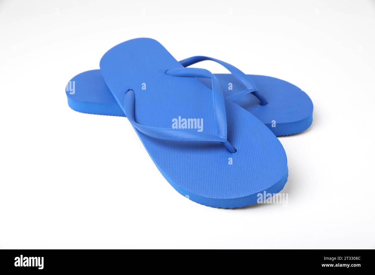 Stylish blue flip flops on white background Stock Photo - Alamy