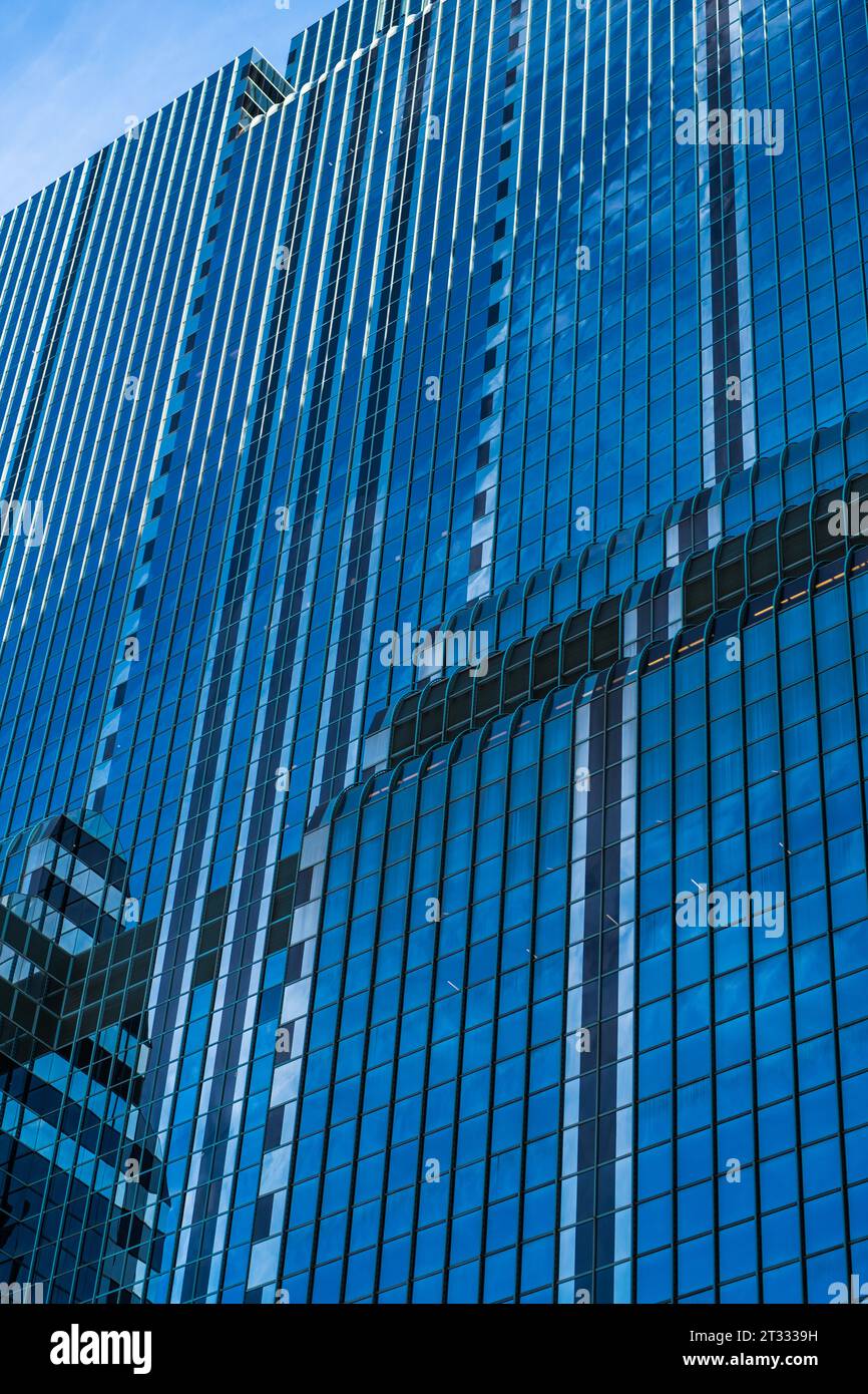 office building in business district. skyscraper building architecture. skyscraper with glassy facade. modern glass building. skyscraper in metropolis Stock Photo