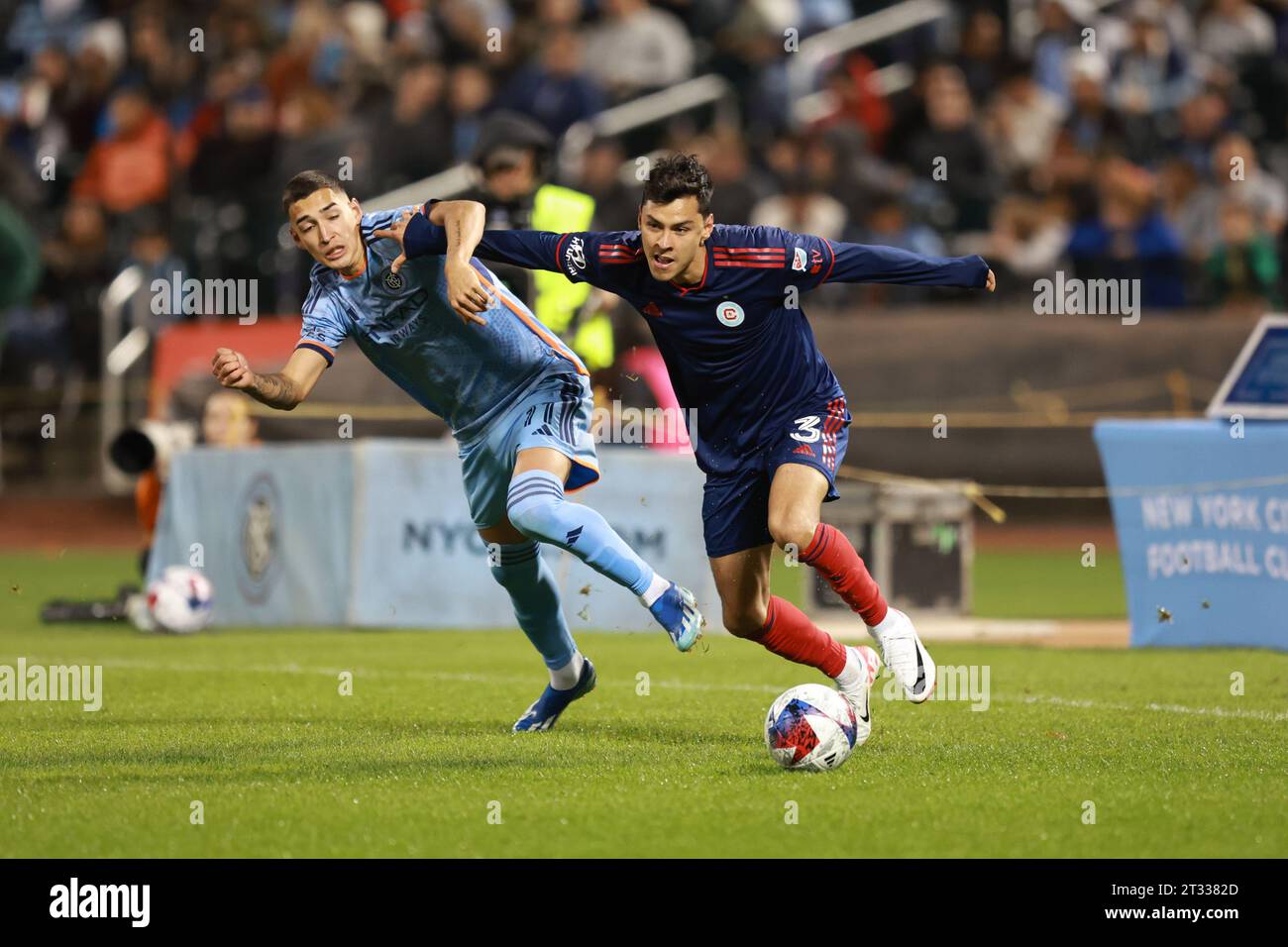 New York City FC forward Julián Fernández (11) is pushed off by Chicago Fire FC defender Daniel Aceves (3) during action in the Major League Soccer match at Citi Field in Corona, New York, Saturday, Oct. 21, 2023. (Photo: Gordon Donovan) Stock Photo