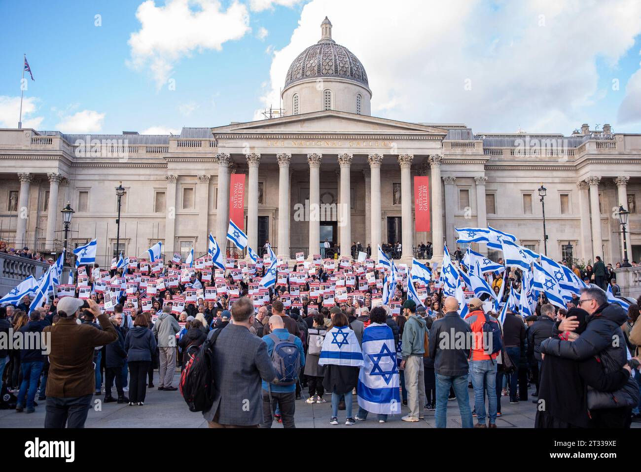 London, UK. 22nd Oct, 2023. Protesters wave flags and hold placards expressing their opinion during the demonstration on the Trafalgar Square in London. Thousands of pro-Israel protesters gathered on the Trafalgar Square in London calling for the safe return of hostages from Gaza. Because more than 200 Israeli civilians have been kidnapped on the 7th of October by the Hamas terrorists. Credit: SOPA Images Limited/Alamy Live News Stock Photo