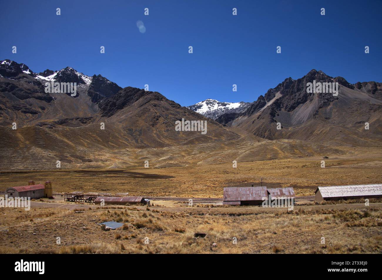 Abra la Raya mountain pass between Puno and Cusco in Peru with railway station Stock Photo