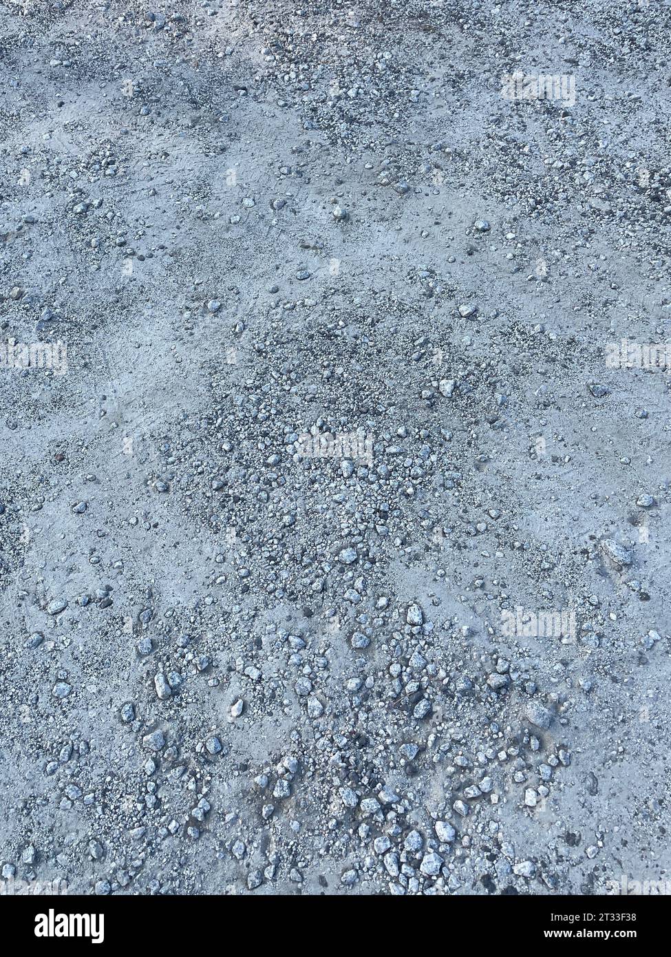 gravel and patchy ground sand and rock background texture Stock Photo