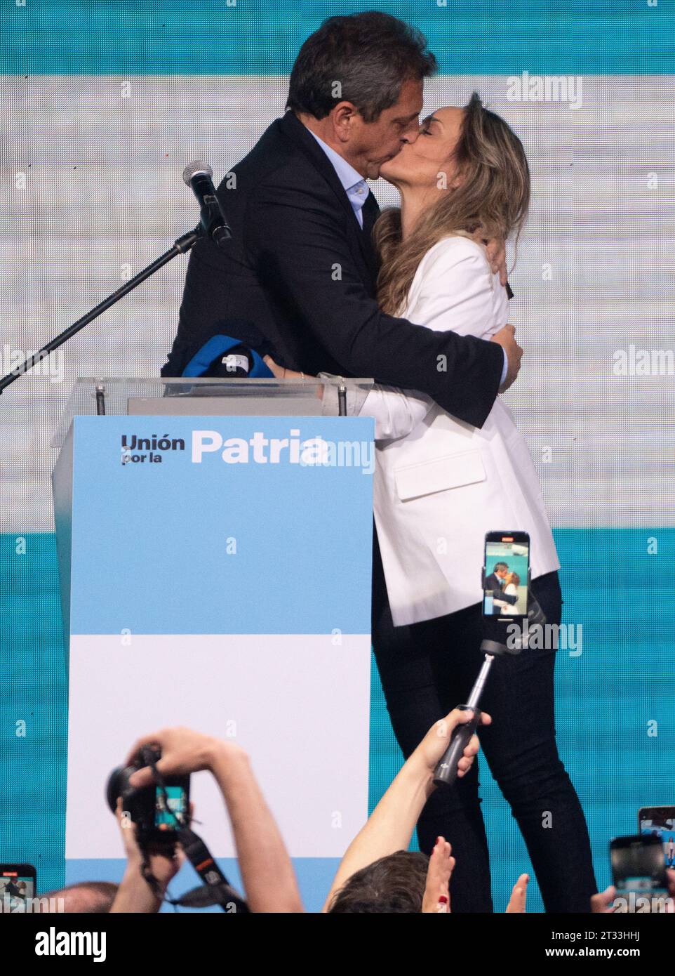 Buenos Aires, Argentina. 22nd Oct, 2023. Sergio Massa, Minister of Economy and presidential candidate of the ruling party, kisses his wife Malena Galmarini at the campaign headquarters after polls closed in the general election in Buenos Aires, Argentina. Massa was in the lead according to initial results and will face ruling party candidate J. Milei in the second round on Nov. 19. Credit: Franco Dergarabedian/dpa/Alamy Live News Stock Photo