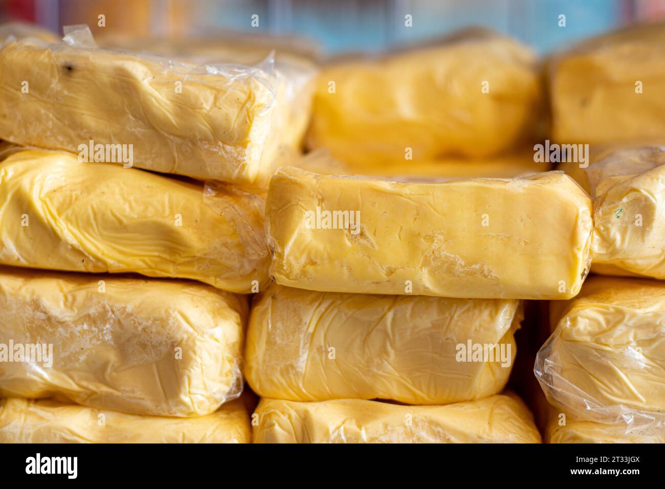 Pile of packaged butter Stock Photo Alamy