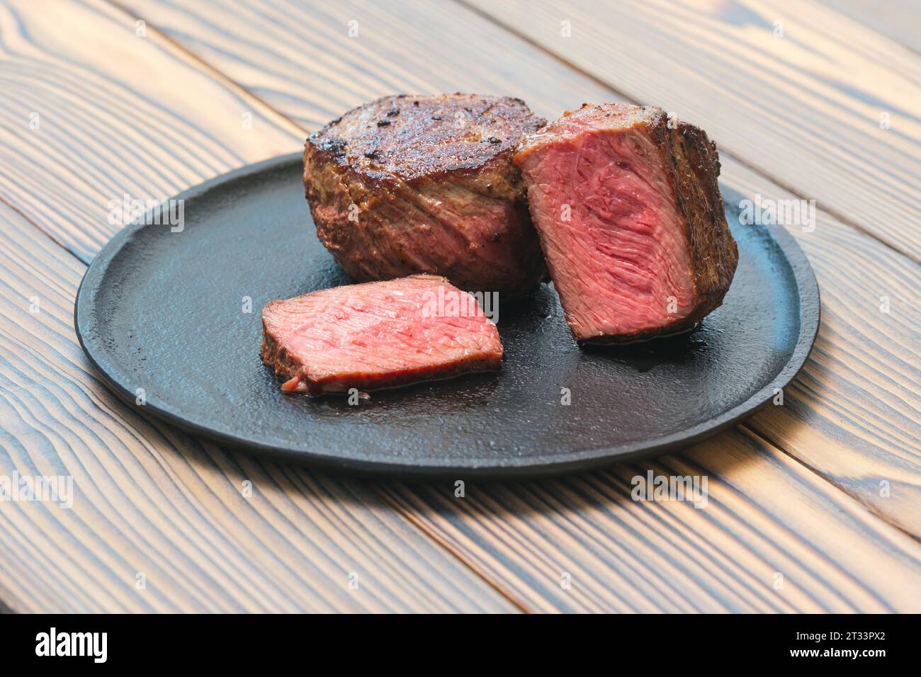 Pan seared fillet mignon on a plate Stock Photo