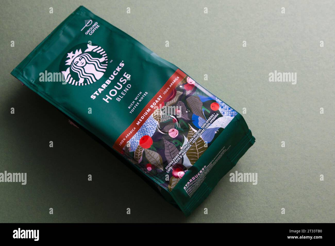 Starbucks coffee packaging. Green pattern background. House blend