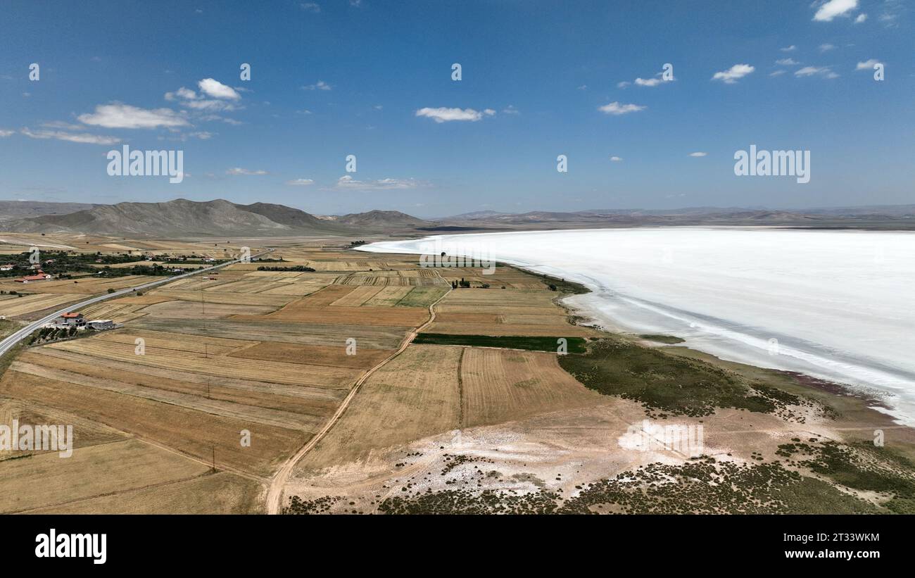 Palas Salt Lake is located between Bunyan and Sarioglan districts of Kayseri. A photo of the lake and surrounding fields taken with a drone. Stock Photo