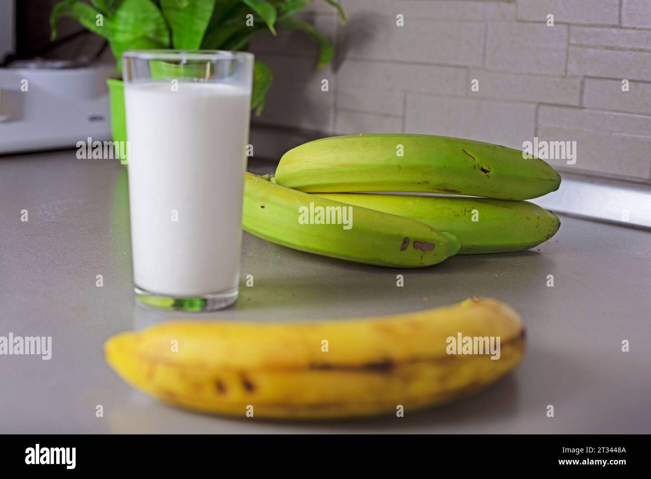 Glass of banana milk hi-res stock photography and images - Alamy