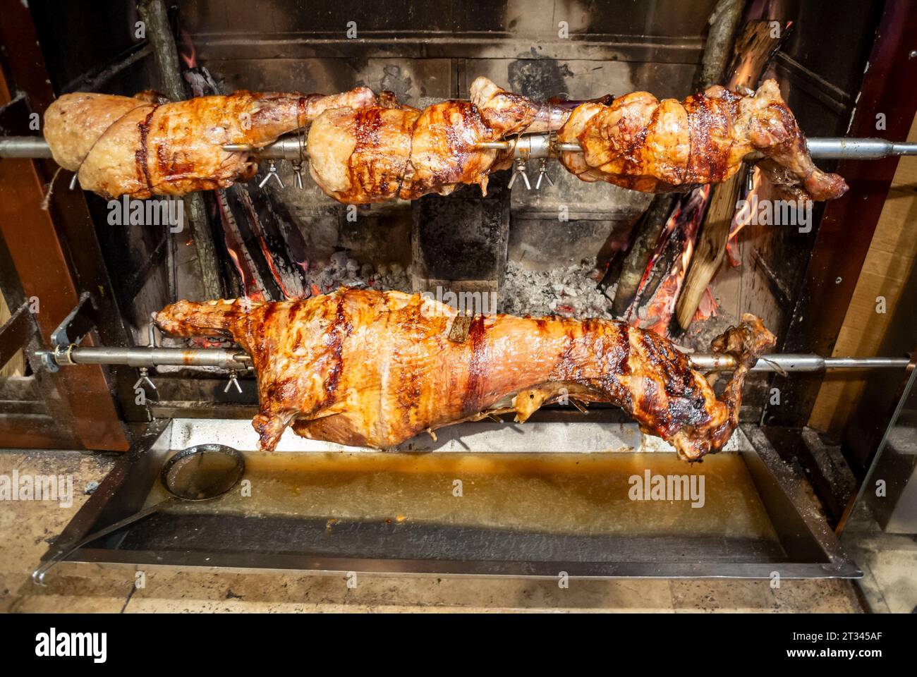 Istanbul, Turkey, A roasting whole lamb with a spit, Editorial only. Stock Photo