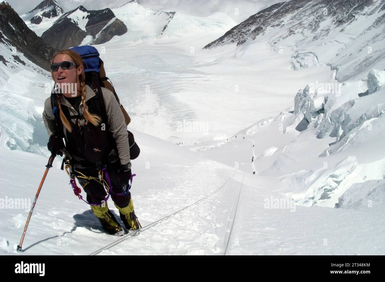 Woman climbing Everest Stock Photo Alamy