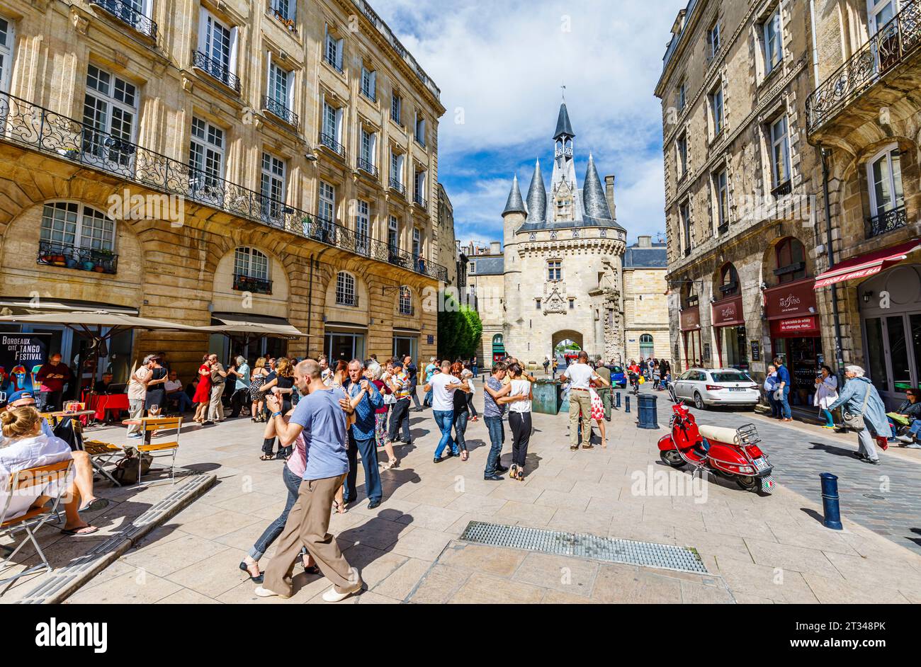 Dancers dancing in the Bordeaux City Tango Festival by Porte Cailhau historic city gate in Bordeaux, a port city in southwestern France Stock Photo