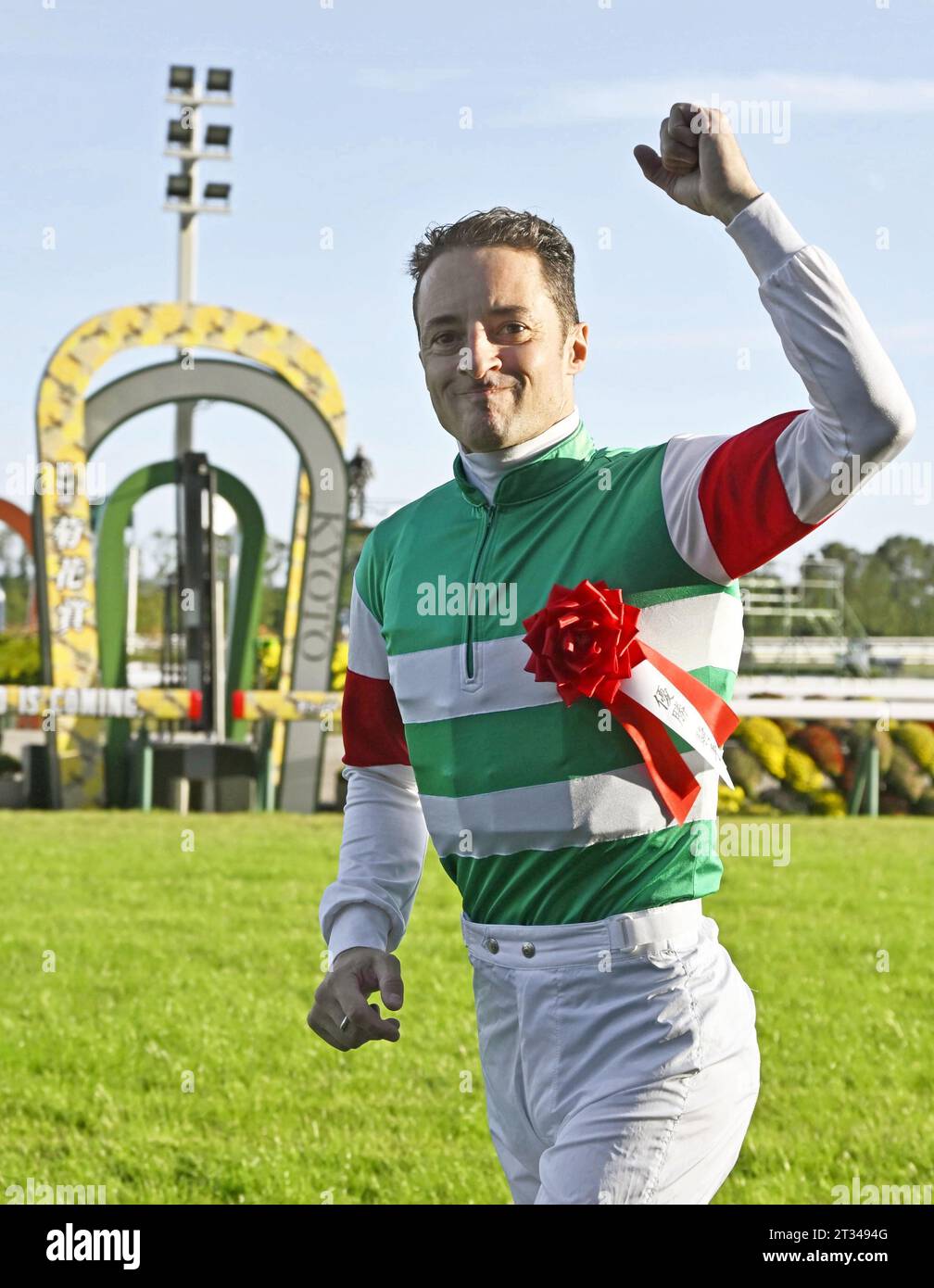 Jockey Christophe Lemaire acknowledges cheers after winning the Kikkasho Grade 1 horse race