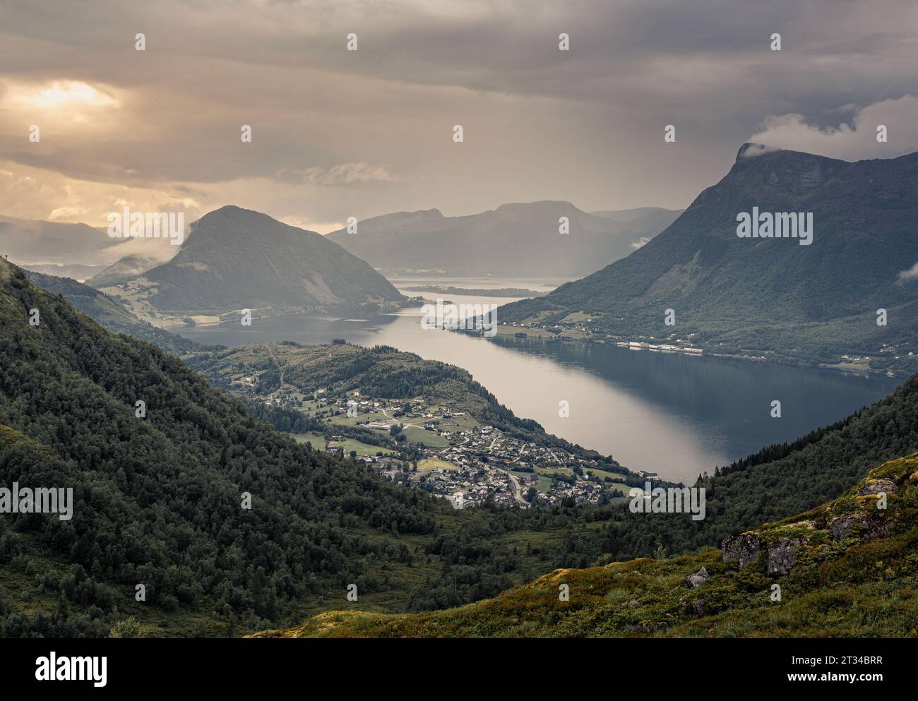 Norwegian fjord landscape with mountains, lakes and village Stock Photo
