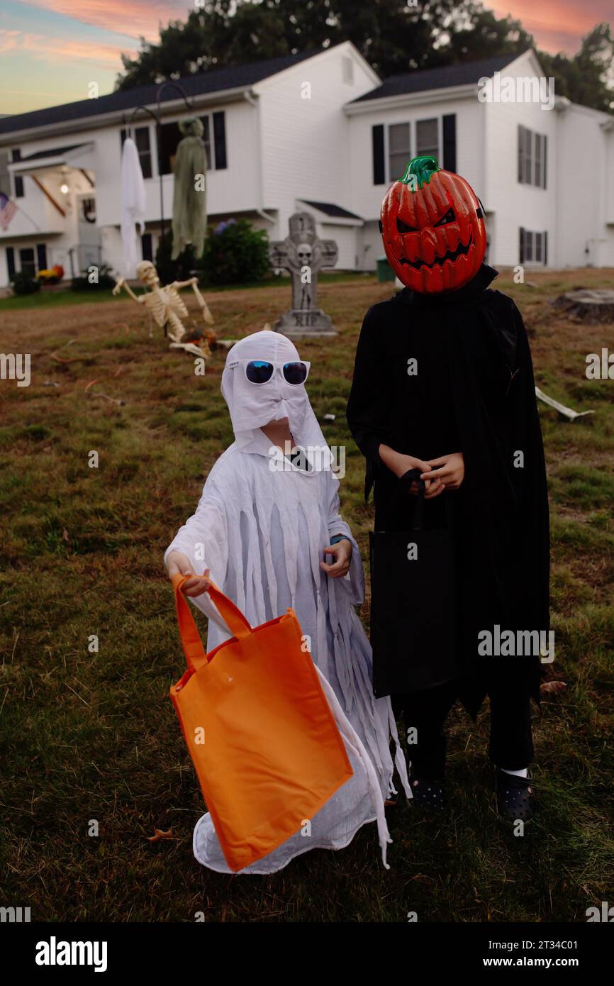 Kids dressed in Halloween Costumes; Trick-or-Treaters Stock Photo