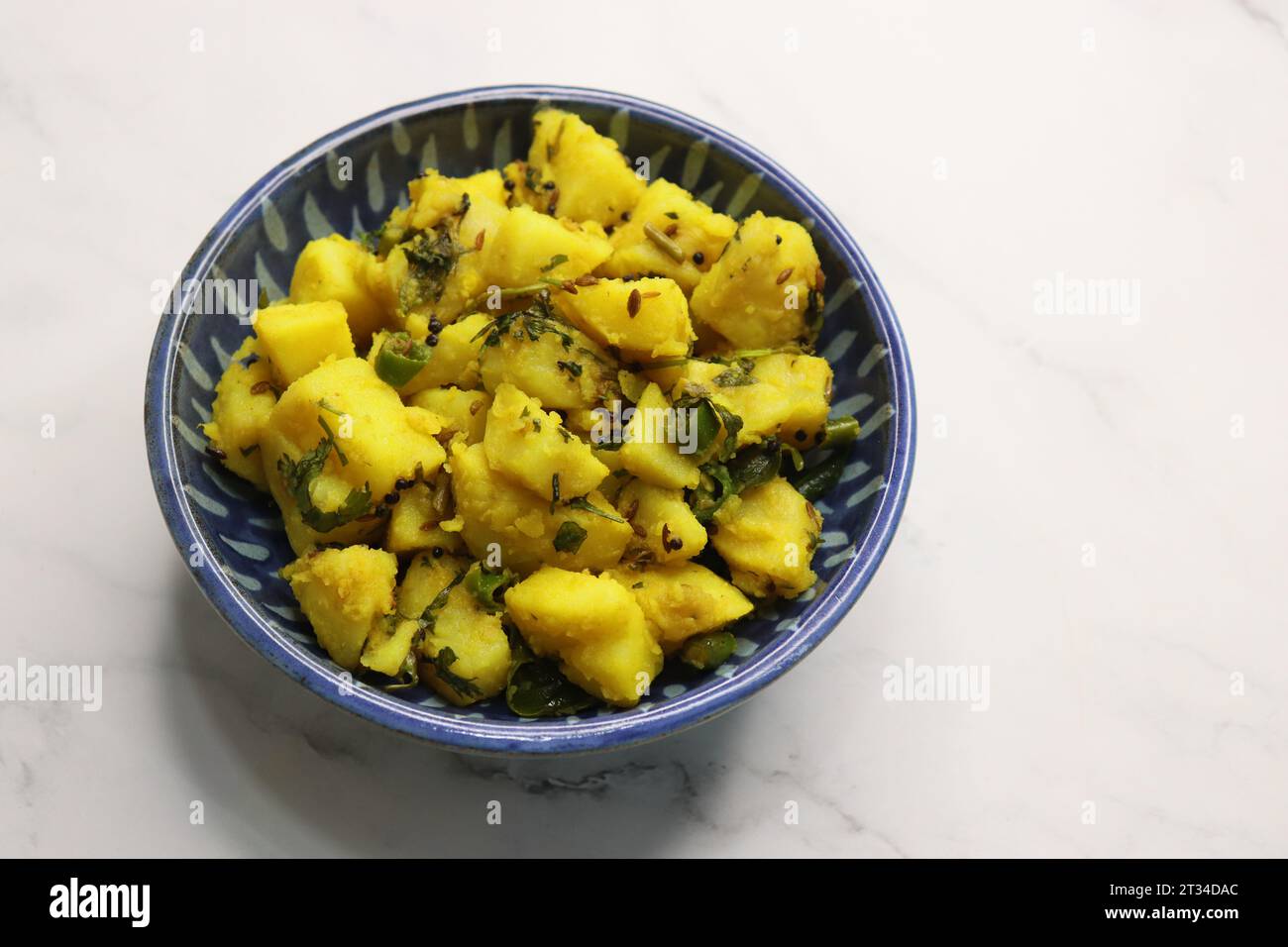 Indian boiled mashed potatoes curry or sabzi. Alu ki sukhi sabzi. Also