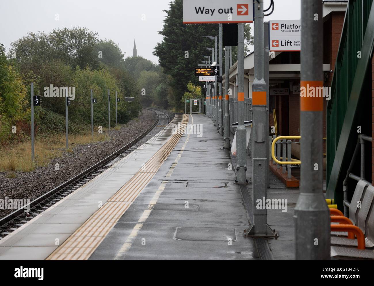 Kenilworth railway station on a dull wet day, Warwickshire, England, UK Stock Photo