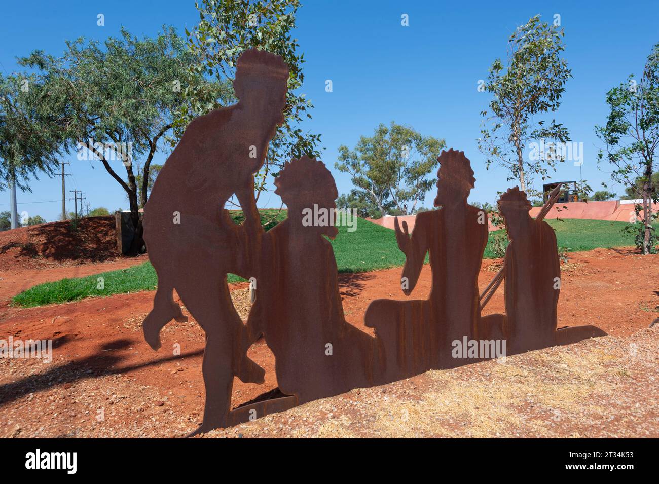 Metal sculptures depicting Aboriginal helpers in the 1906 Alfred Canning expedition to map the Canning Stock Route, Wiluna, Western Australia, Austral Stock Photo