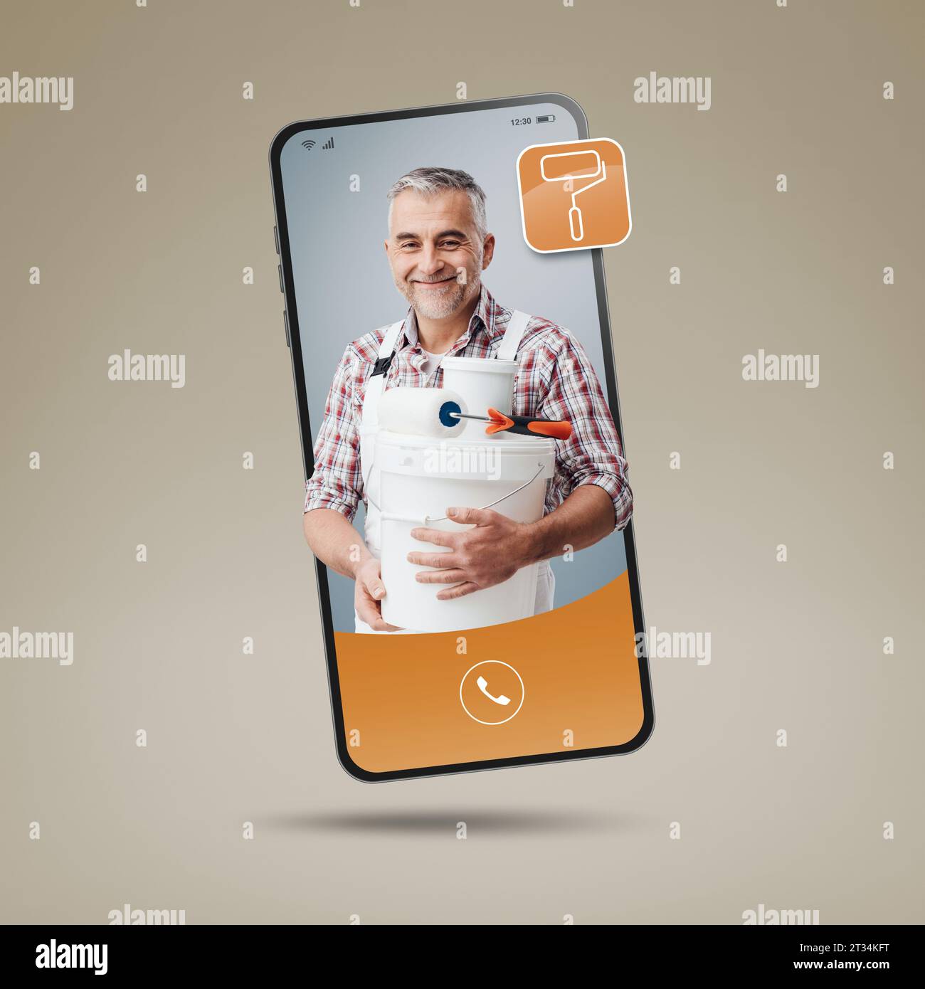Professional painter videocalling on smartphone screen, hire a contactor online Stock Photo
