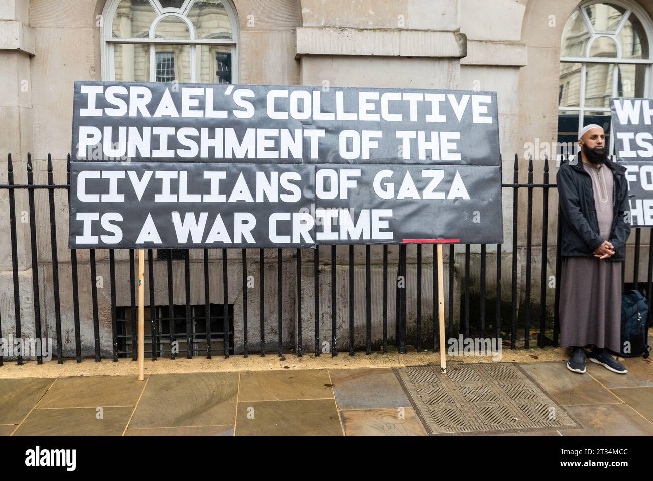 Large placard at a Free Palestine protest in London following the escalation of the conflict in Israel and Gaza. War crime message Stock Photo