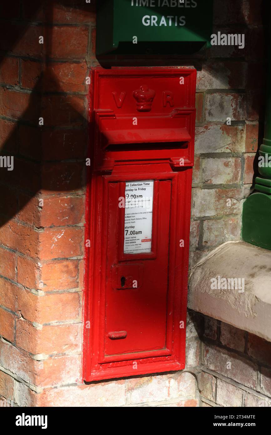 Post box in the United Kingdom bearing the Royal Cypher of Queen Victoria, who reigned for 64 years from 20 June 1837 to 22 January 1901. Sussex, UK. Stock Photo