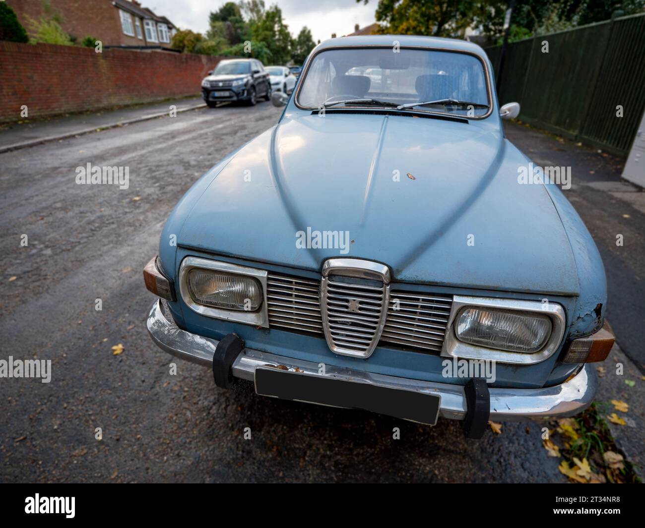 A 1971 Saab 96 V4 Classic car parked in London.  Classic cars more than 40 years old are exempt from ULEZ, leading to a renewed interest in buying vintage reliable cars over 40 years old. Stock Photo