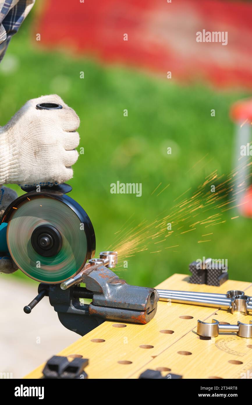 Metal saw cuts steel rod hi-res stock photography and images - Alamy