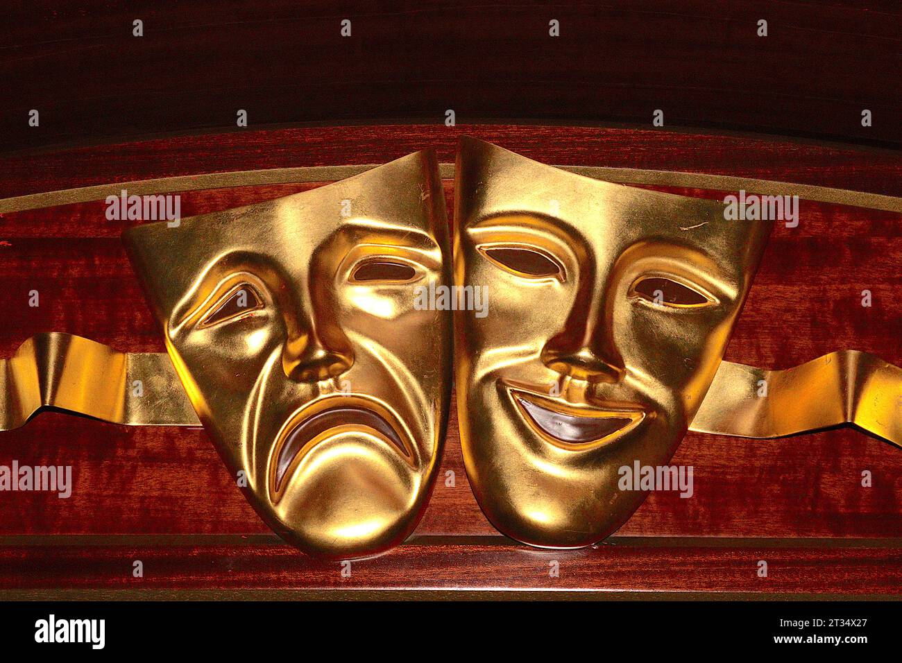 Happy and Sad, Comedy and Tragedy Theatrical masks, a welcoming sign greeting patrons to the Curzon Theatre aboard the cruise ship Aurora. Stock Photo