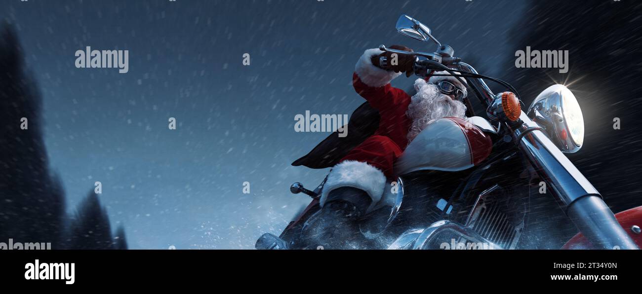 Cool Santa Claus biker riding a fast motorcycle, unconventional Christmas concept Stock Photo