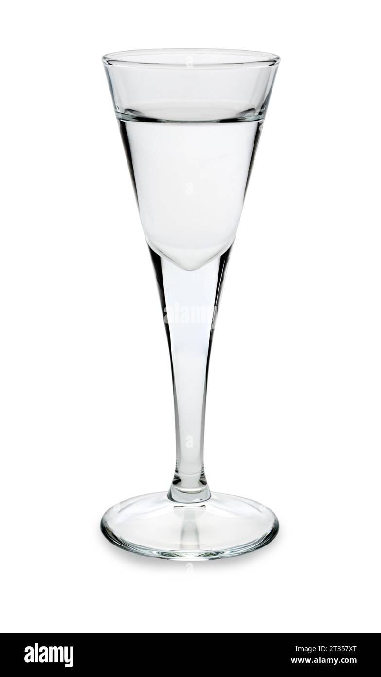Gin or vodka or grappa in a goblet shot glass isolated on white with clipping path included Stock Photo