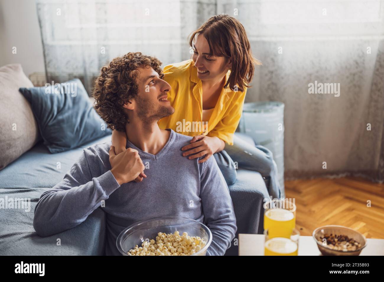 Cheerful man talking holding hands hi-res stock photography and images ...