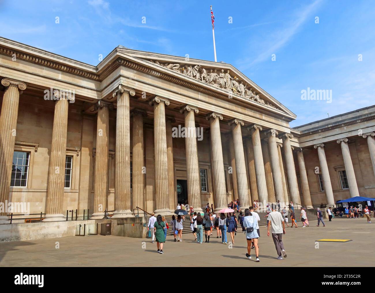 Visitors outside the British Museum in London, Great Russell St, WC1B 3DG Stock Photo