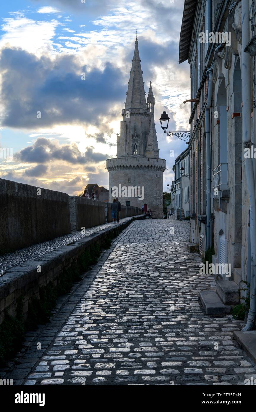 Almost dark at The Lantern Tower - Tour de la Lanterne - in La Rochelle. This Medieval lighthouse with a Gothic spire also held prisoners as a jail. Stock Photo