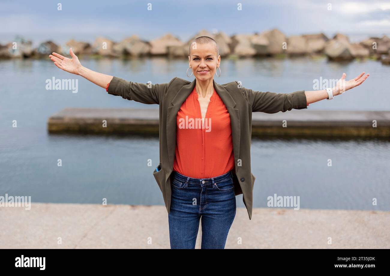 Woman shaved head standing on hi-res stock photography and images - Alamy