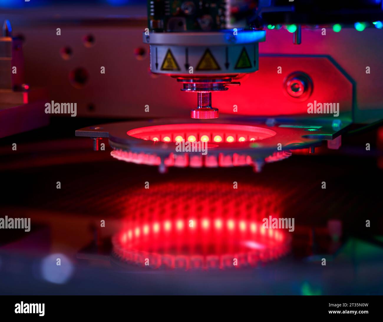 Red glowing wafer heater machine at industry Stock Photo