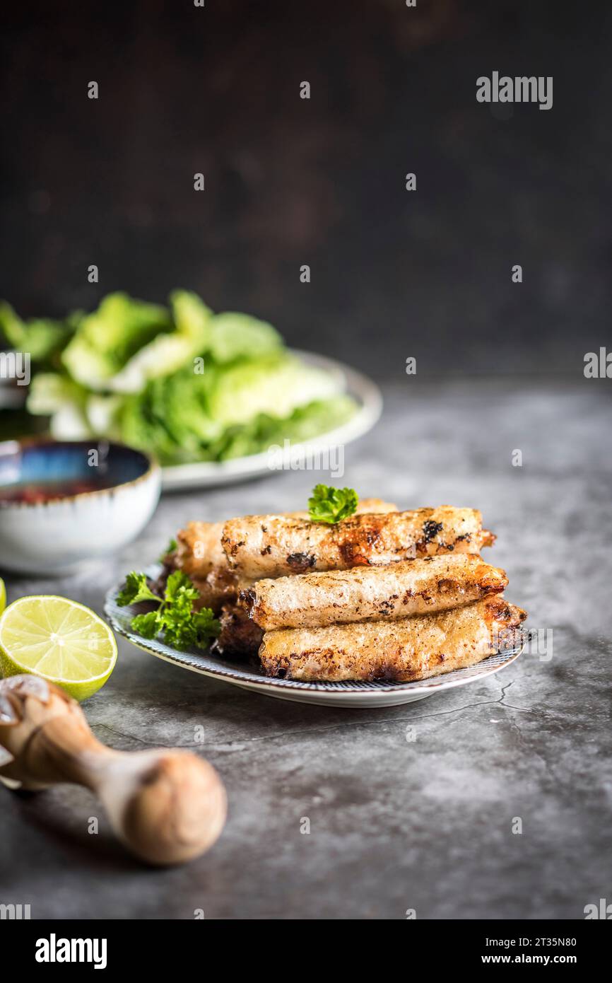 Vietnamese fried spring rolls with nuoc cham sauce Stock Photo