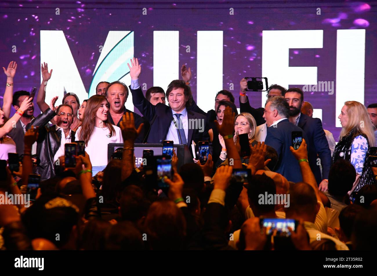 Buenos Aires, Argentina. 22nd Oct, 2023. Javier Milei (M), presidential candidate of the La Libertad Avanza party, is cheered by supporters after the announcement of the election results. Credit: Igor Wagner/dpa/Alamy Live News Stock Photo