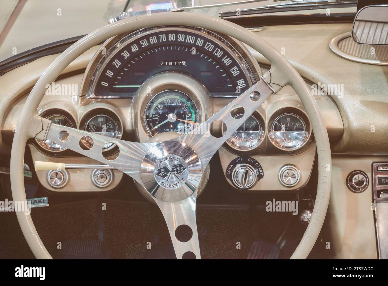 Essen, Germany - March 23, 2022: Retro styled image of a dashboard of a 1961 Chevrolet Corvette C1 Fuel Injection convertible car in Essen, Germany Stock Photo