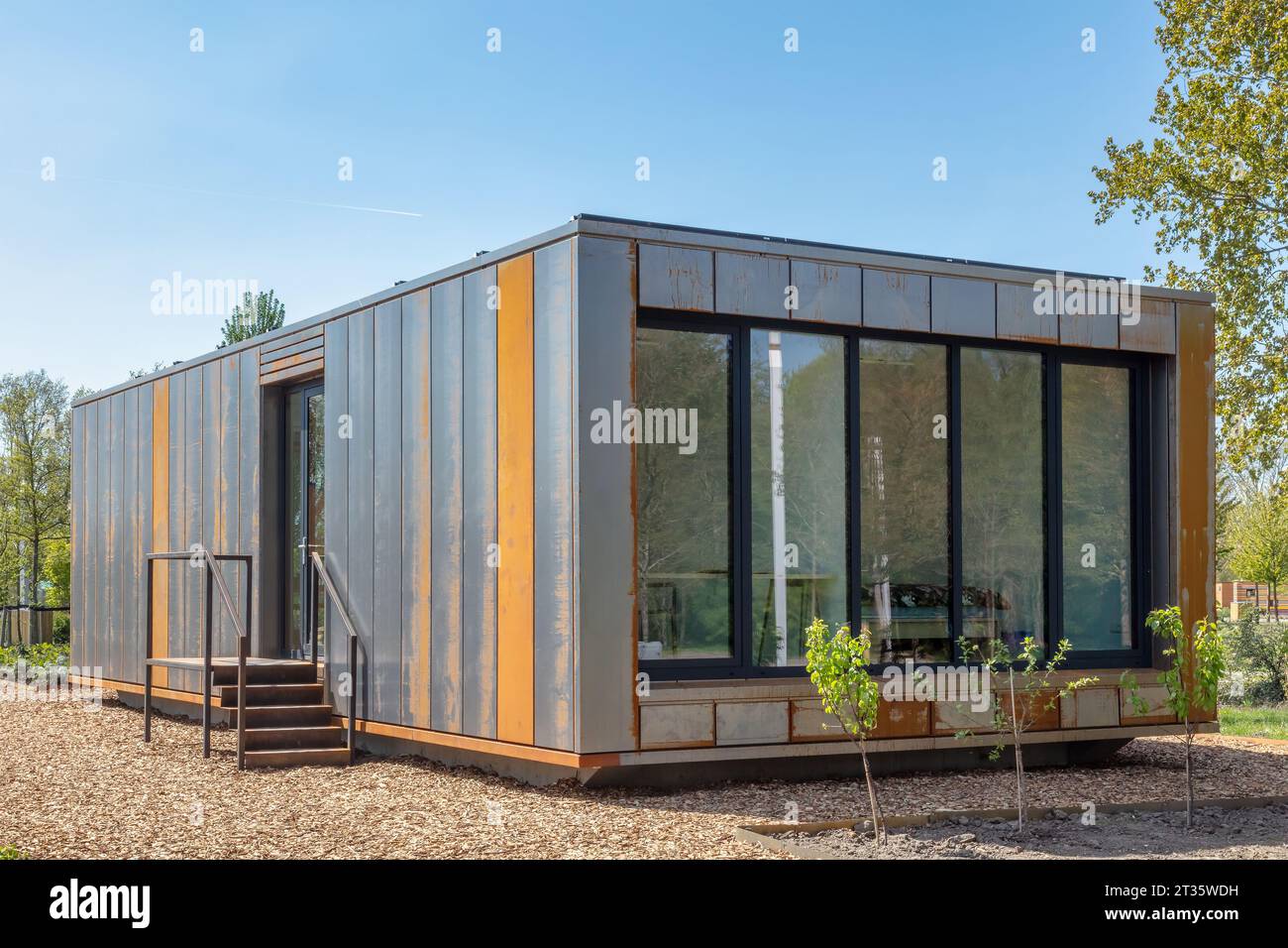 Almere, The Netherlands - April 21, 2022: Contemporary designed new corten steel tiny house on the Floriade expo in Almere, The Netherlands Stock Photo