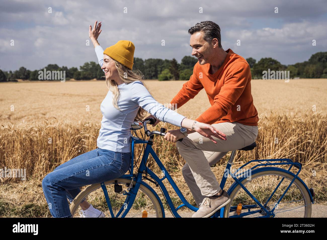 Man woman ride bicycle hi-res stock photography and images - Alamy