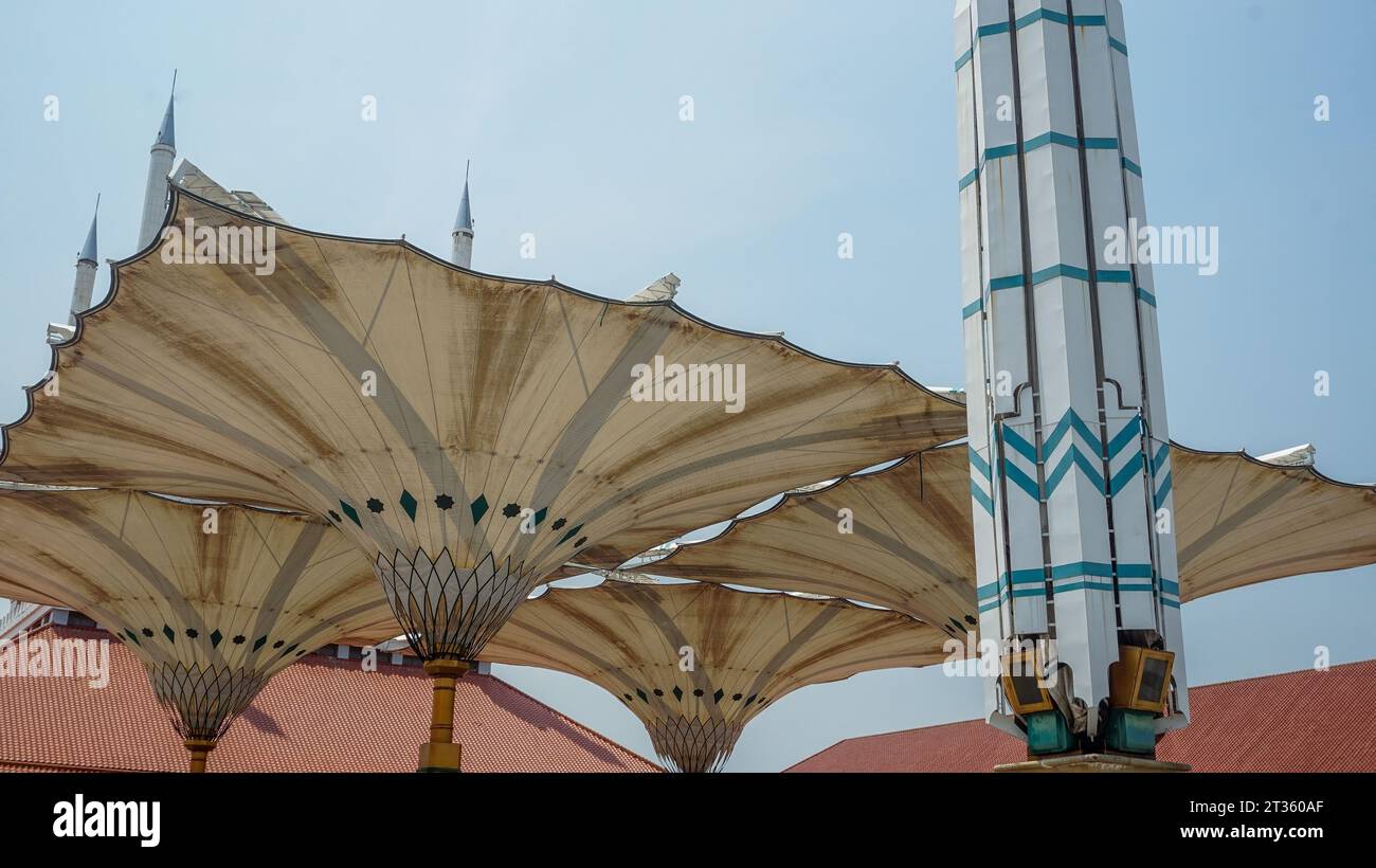 One of the ornaments of the Grand Mosque in Central Java is a giant hydraulic umbrella that can open and close automatically Stock Photo
