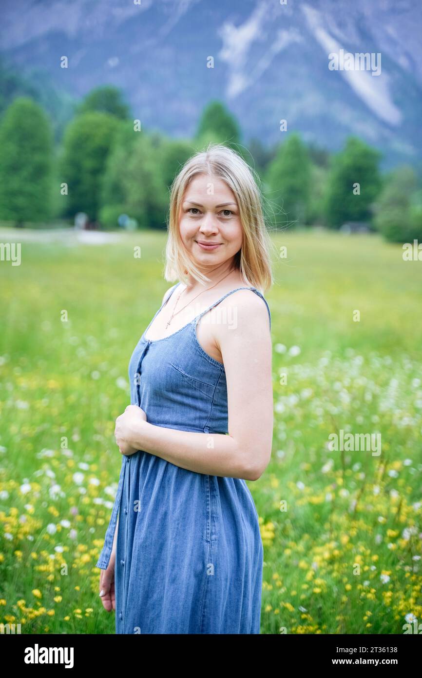 Woman in blue dress outdoors hi-res stock photography and images - Alamy