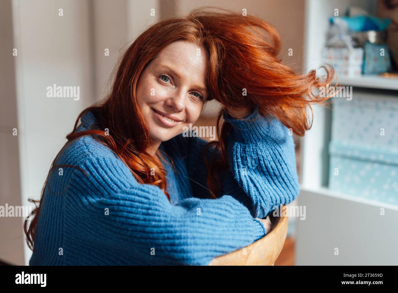 Redhead woman in cardigan hi-res stock photography and images - Alamy