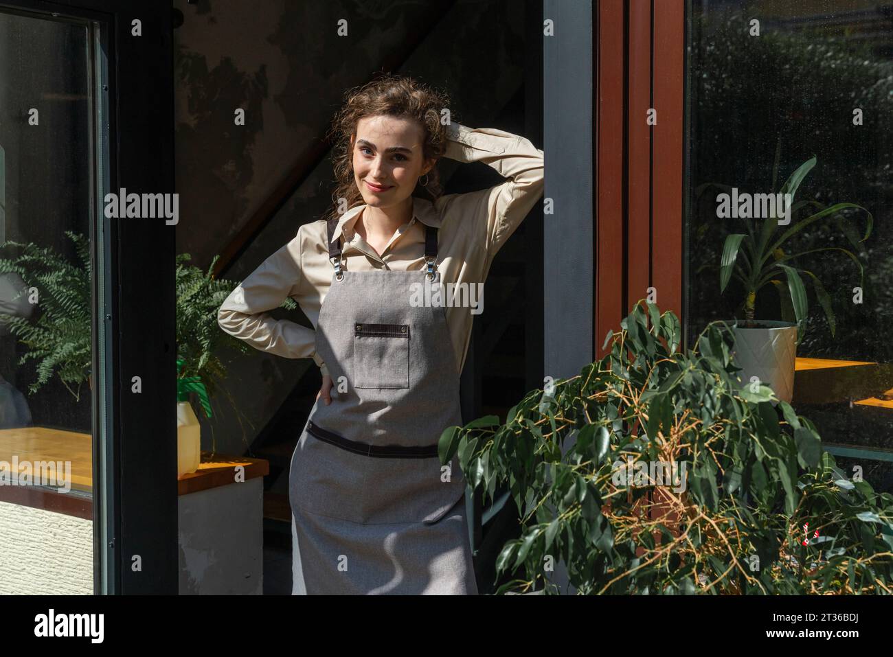 Young woman outdoors wearing apron hi-res stock photography and images ...