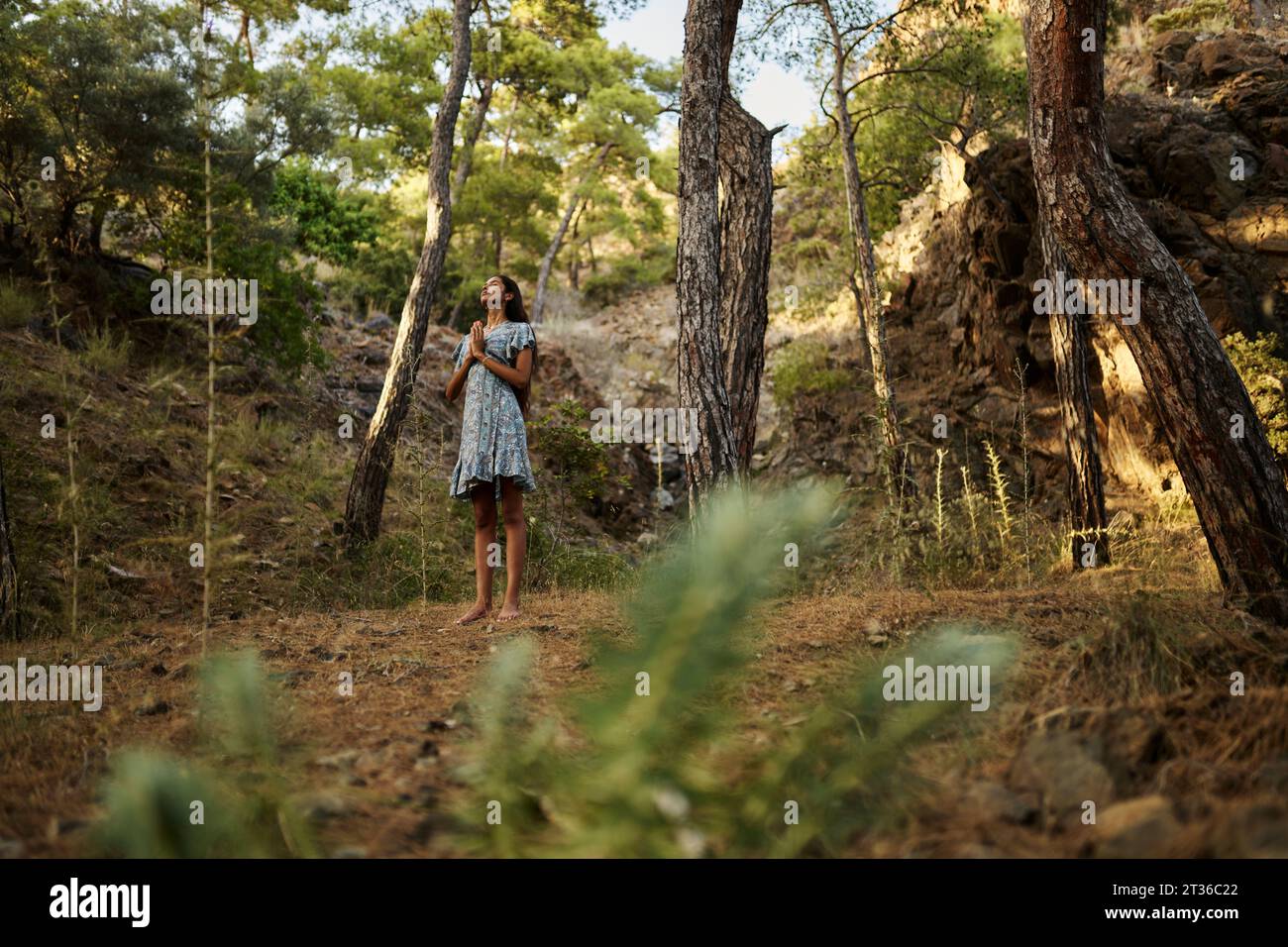 Girl folded hands in prayer hi-res stock photography and images - Alamy