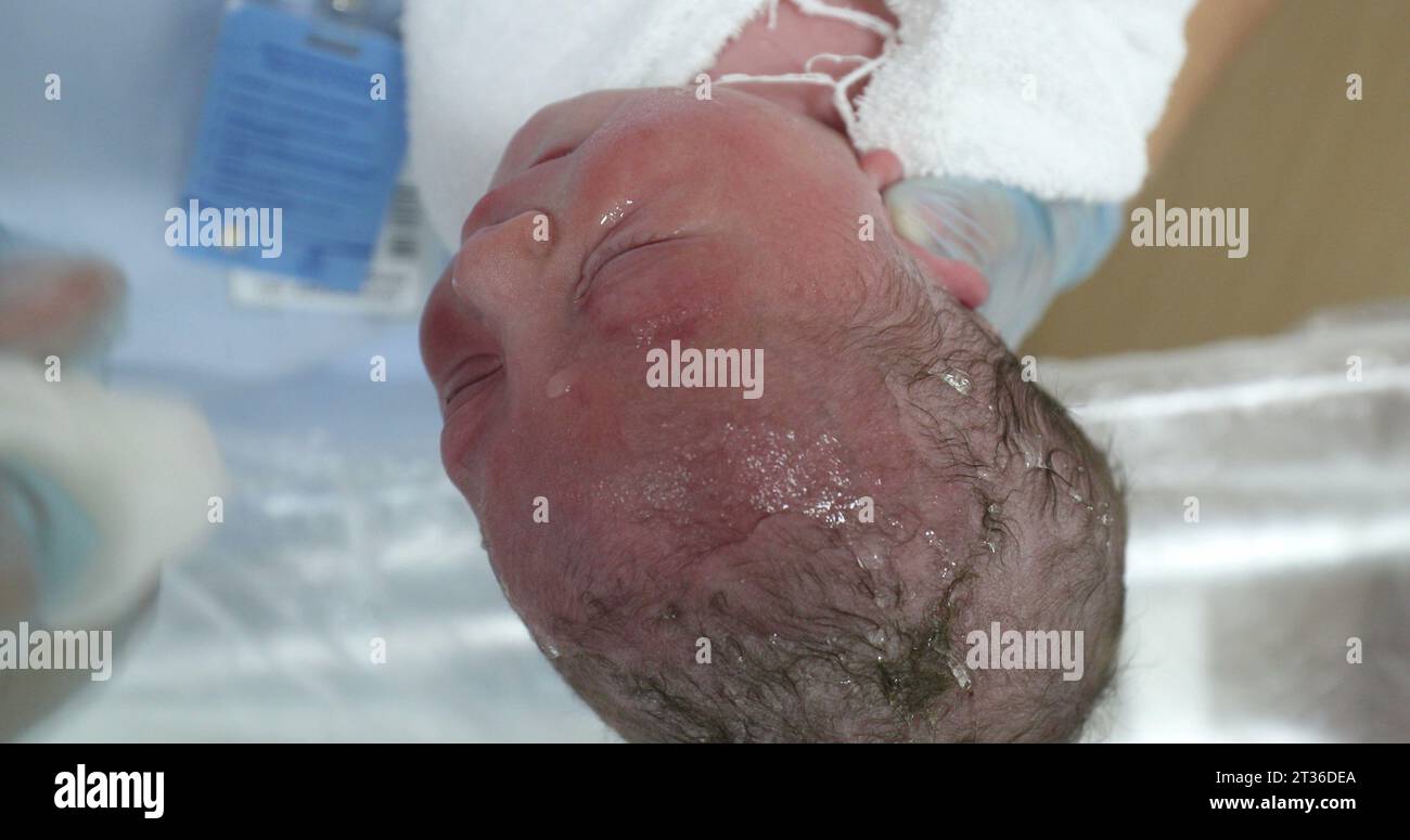 Newborn baby bath at hospital after birth Stock Photo - Alamy
