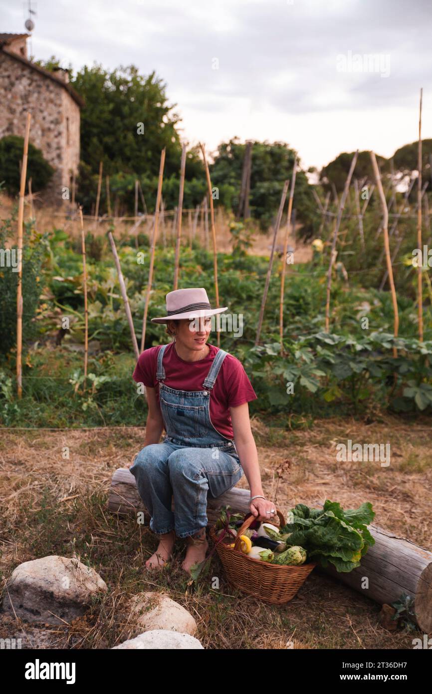Farm woman overalls vegetables hi-res stock photography and images - Alamy