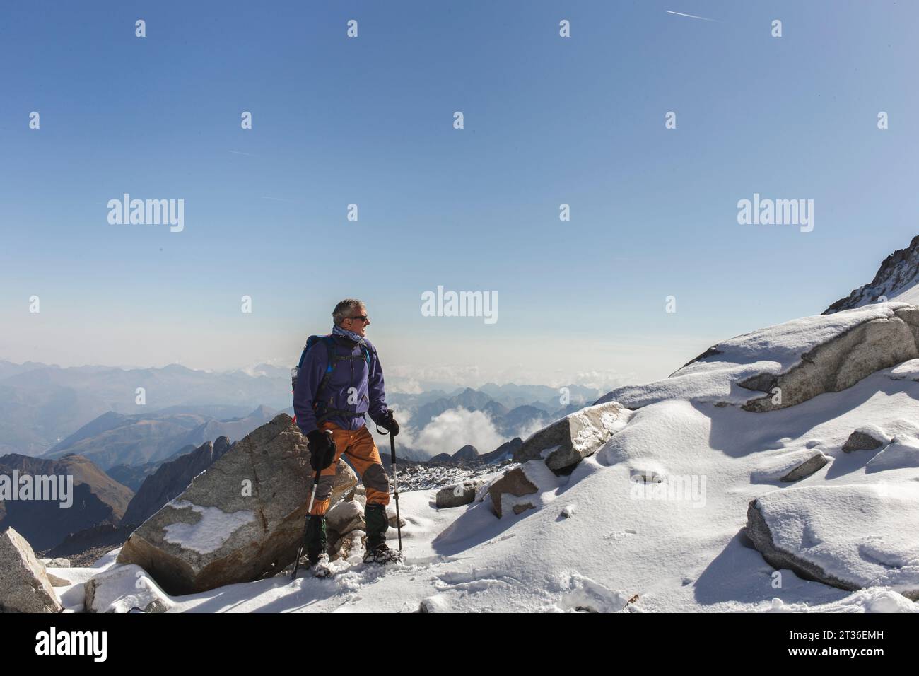 Man with hiking pole hi-res stock photography and images - Alamy