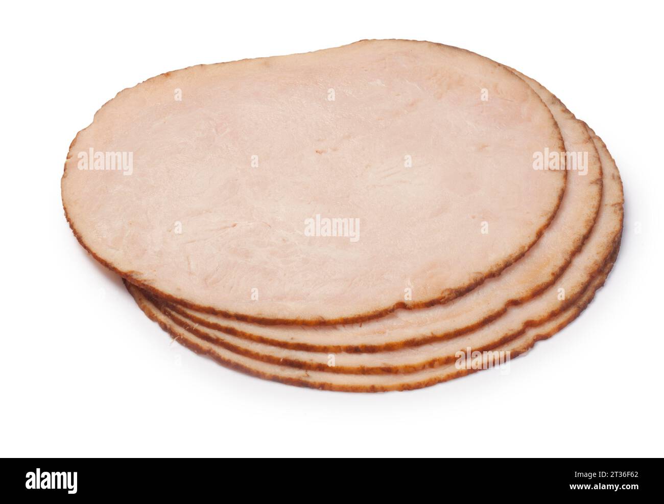 Studio shot of turkey breast roll cut out against a white background - John Gollop Stock Photo