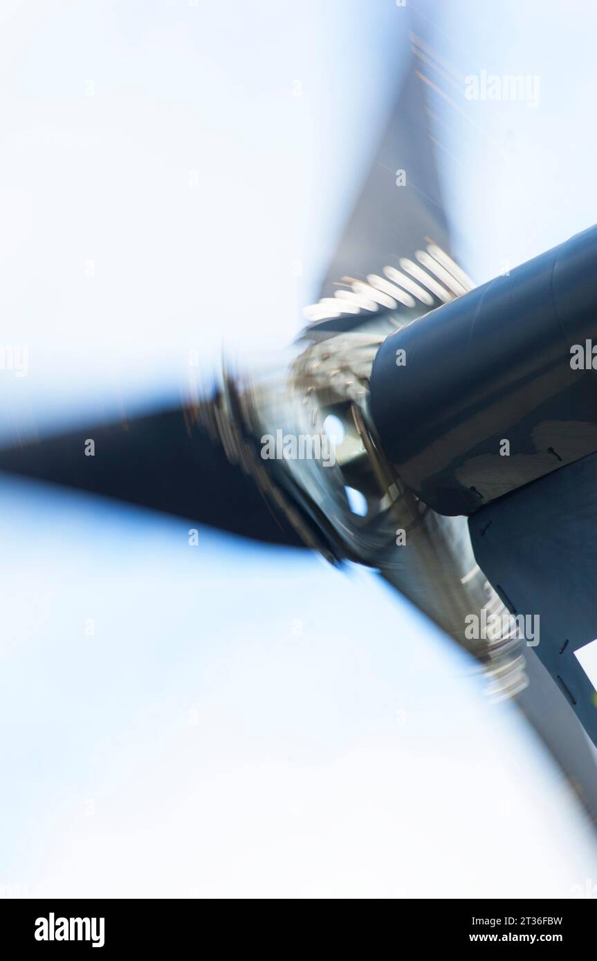 Blurred blades of a small turbine - John Gollop Stock Photo